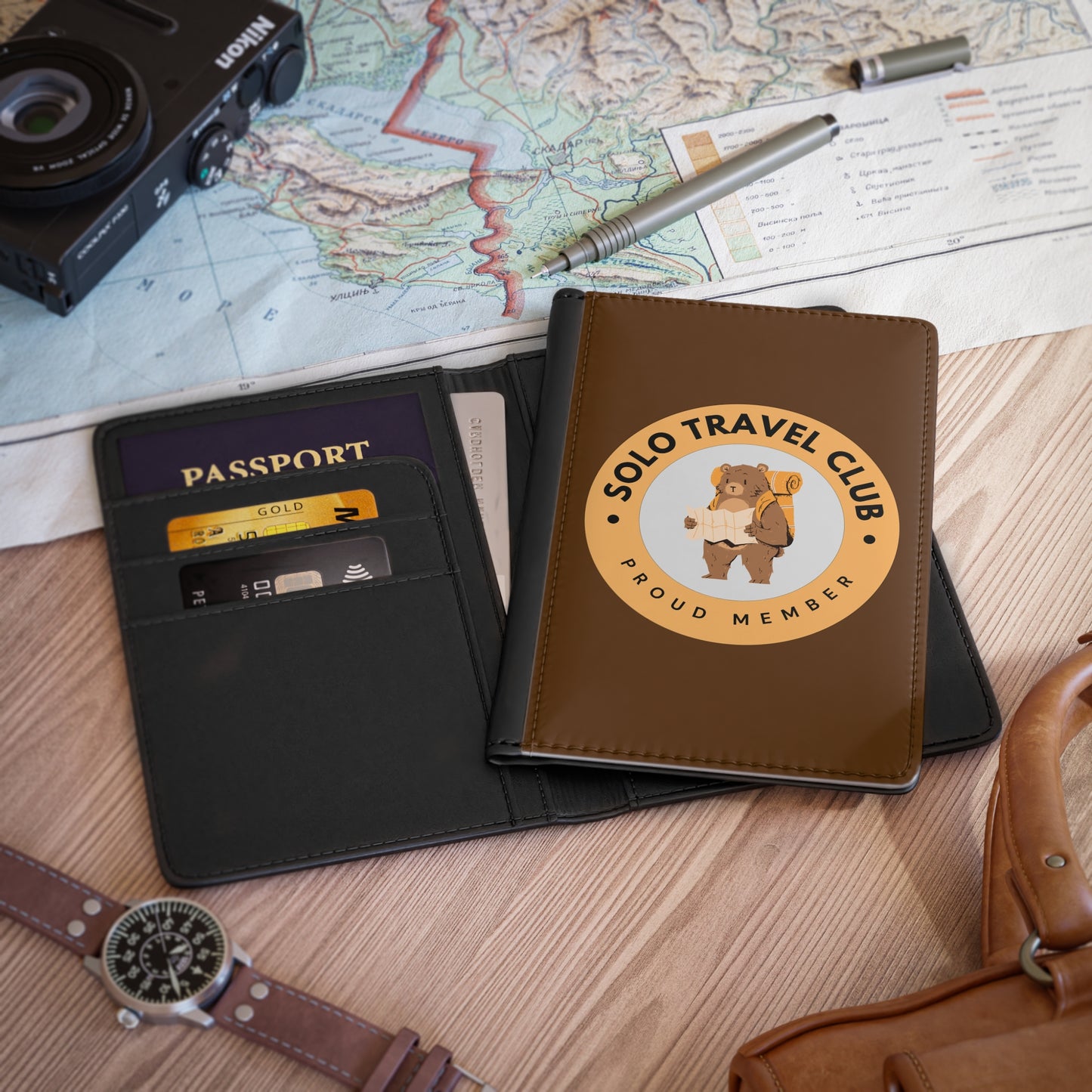 Solo Travel Club Passport Cover – Bear Badge (Earth Symbol Guide)